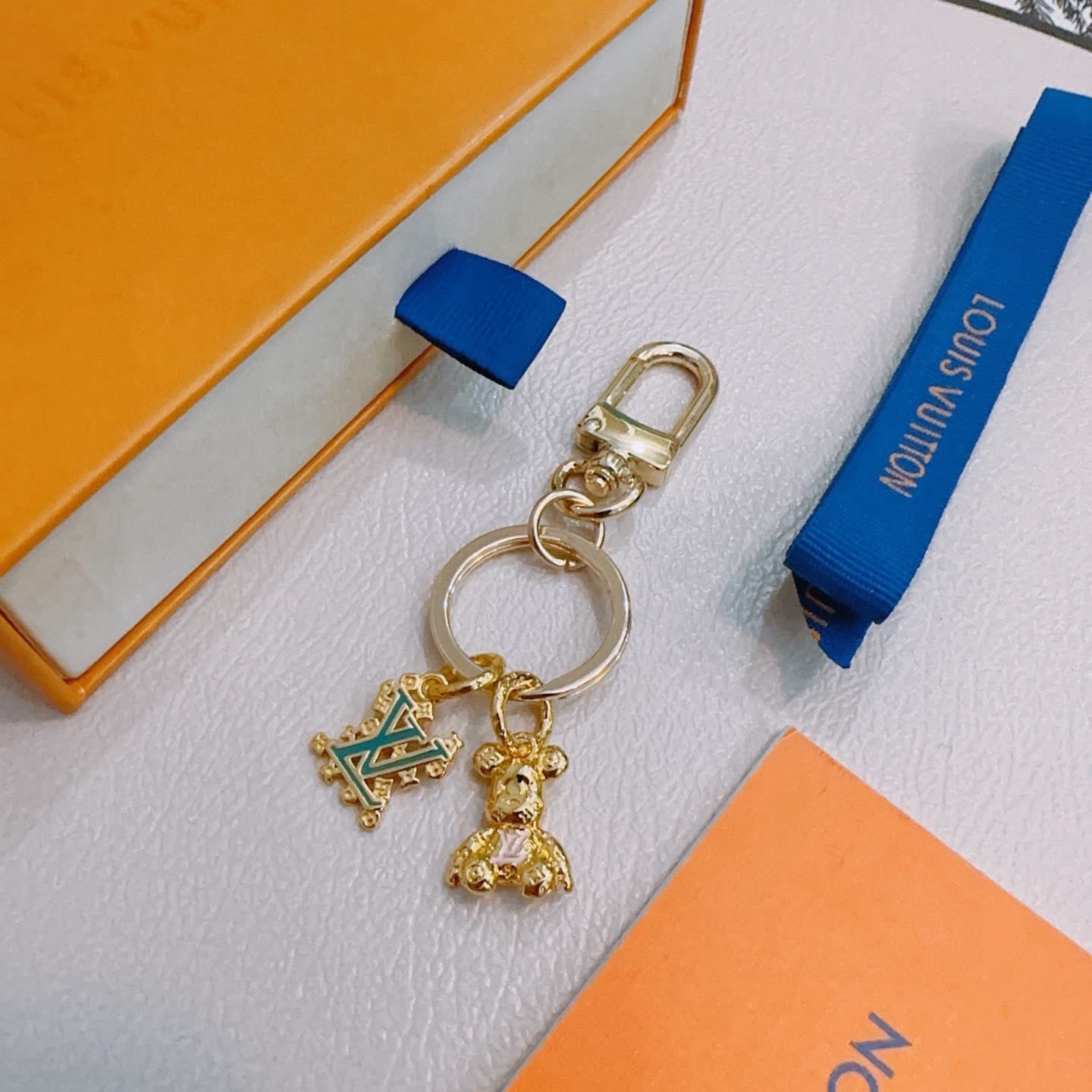 Louis Vuitton Keychain with Monogram and Bear Charm